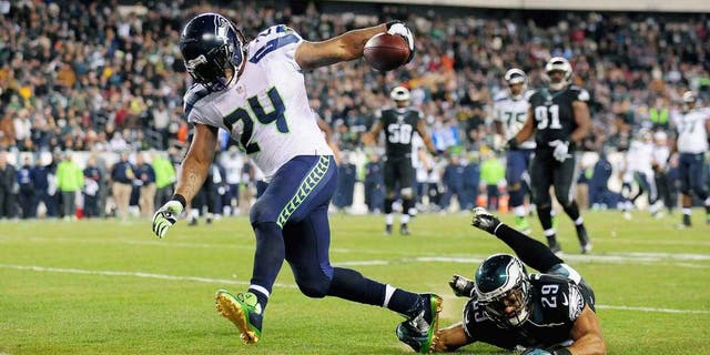 Mark Sanchez #3 of the Philadelphia Eagles looks to pass the ball against the Carolina Panthers on November 10, 2014 at Lincoln Financial Field in Philadelphia, Pennsylvania. (Photo by Elsa/Getty Images) Richard Sherman #25 of the Seattle Seahawks defends against the St. Louis Rams at the Edward Jones Dome on October 19, 2014 in St. Louis, Missouri. (Photo by Michael B. Thomas/Getty Images)