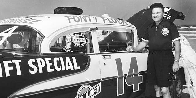 DAYTONA BEACH, FL - 1955: Fonty Flock with Frank Christian's 1955 Air Lift Special Oldsmobile at the Daytona Beach-Road Course in 1955. Flock finished fifth in the Grand National race that year. (Photo by ISC Archives via Getty Images)