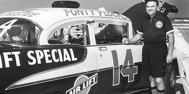 DAYTONA BEACH, FL - 1955: Fonty Flock with Frank Christian's 1955 Air Lift Special Oldsmobile at the Daytona Beach-Road Course in 1955. Flock finished fifth in the Grand National race that year. (Photo by ISC Archives via Getty Images)