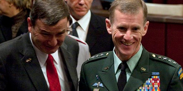 Ambassador to Afghanistan Karl Eikenberry, left, and Army Gen. Stanley McChrystal before giving testimony assessing the results in Afghanistan to the House Armed Services Committee, Tuesday, Dec. 8, 2009.