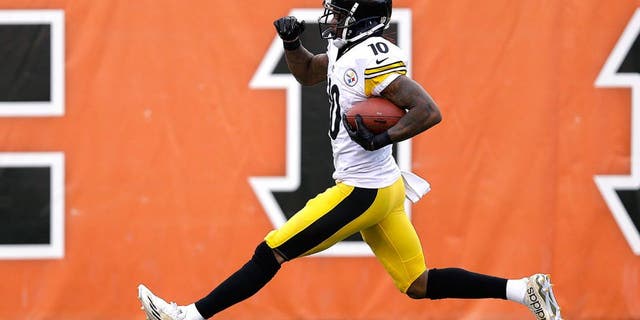 Pittsburgh Steelers wide receiver Martavis Bryant (10) runs for a 94-yard touchdown reception during the second half of an NFL football game against the Cincinnati Bengals Sunday, Dec. 7, 2014 in Cincinnati. (AP Photo/Michael Conroy)