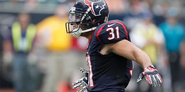 HOUSTON, TX- NOVEMBER 17: Shiloh Keo #31 of the Houston Texans celebrates against the Oakland Raiders on November 17, 2013 at Reliant Stadium in Houston, Texas. Raiders won 28 to 23.(Photo by Thomas B. Shea/Getty Images)