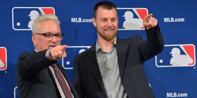 Ben Zobrist, right, with Chicago Cubs manager Joe Maddon in December.