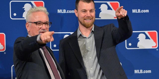 Ben Zobrist, right, with Chicago Cubs manager Joe Maddon in December.