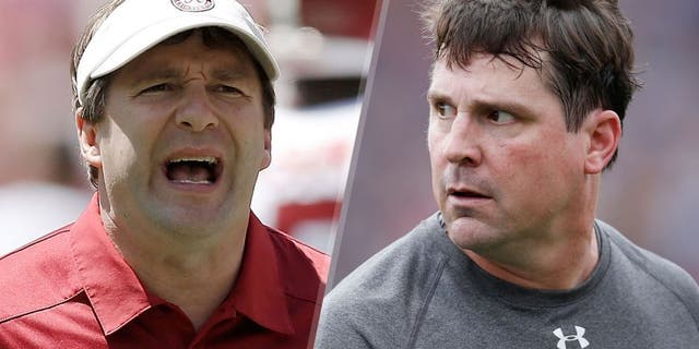TUSCALOOSA, AL - APRIL 19: Defensive coordinator Kirby Smart of the Alabama Crimson Tide reacts to a play prior to the University of Alabama A-Day spring game at Bryant-Denny Stadium on April 19, 2014 in Tuscaloosa, Alabama. (Photo by Stacy Revere/Getty Images) AUBURN, AL - OCTOBER 31: Defensive coordinator Will Muschamp of the Auburn Tigers looks on from the sideline during a game against the Ole Miss Rebels at Jordan-Hare Stadium on October 31, 2015 in Auburn, Alabama. Ole Miss defeated Auburn 27-19. (Photo by Joe Robbins/Getty Images)