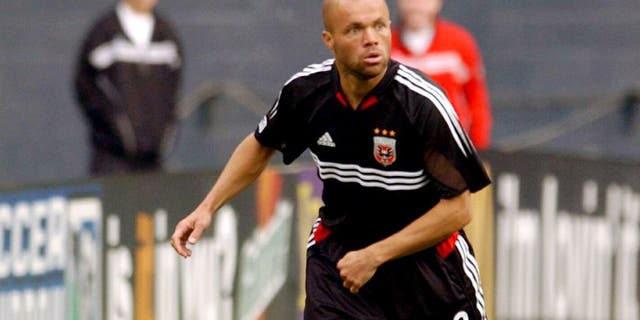 Earnie Stewart #8 of D.C. United looks to kick the ball against the San Jose Earthquakes in Washington D.C. on April 3, 2004. D.C. United defeated the Earthquakes 2-1. (Photo by Joe Murphy/MLSNETImages)