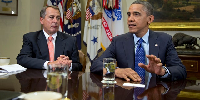 Nov. 16, 2012: President Barack Obama, accompanied by House Speaker John Boehner of Ohio, speaks to reporters in the Roosevelt Room of the White House in Washington.