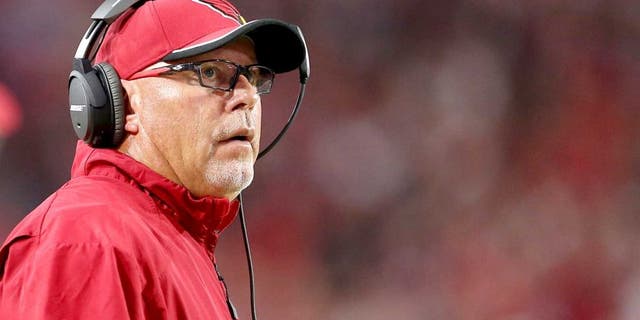GLENDALE, AZ - DECEMBER 07: Head coach Bruce Arians of the Arizona Cardinals looks up to the video board during the NFL game against the Kansas City Chiefs at the University of Phoenix Stadium on December 7, 2014 in Glendale, Arizona. The Cardinals defeated the Chiefs 17-14. (Photo by Christian Petersen/Getty Images)