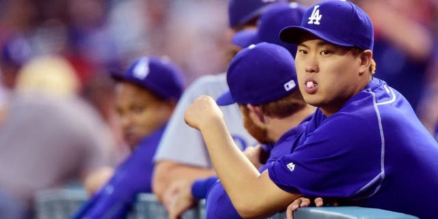 ANAHEIM, CA - SEPTEMBER 09: Hyun-Jin Ryu #99 of the Los Angeles Dodgers waits for play to begin against the Los Angeles Angels of Anaheim at Angel Stadium of Anaheim on September 9, 2015 in Anaheim, California. (Photo by Harry How/Getty Images)