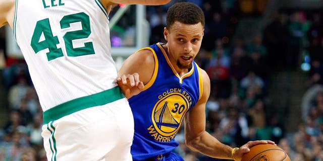 Dec 11, 2015; Boston, MA, USA; Golden State Warriors guard Stephen Curry (30) tries to get around Boston Celtics forward David Lee (42) during the first half at TD Garden. Mandatory Credit: Winslow Townson-USA TODAY Sports