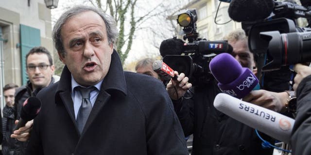UEFA president and FIFA vice president Michel Platini speaks to the press as he arrives at the Court of Arbitration for Sport (CAS) to appeal against a 90-day suspension in Lausanne on December 8, 2015. The appeal is part of a new campaign by Platini to get back into the election for a new FIFA leader on February 26. / AFP / FABRICE COFFRINI (Photo credit should read FABRICE COFFRINI/AFP/Getty Images)