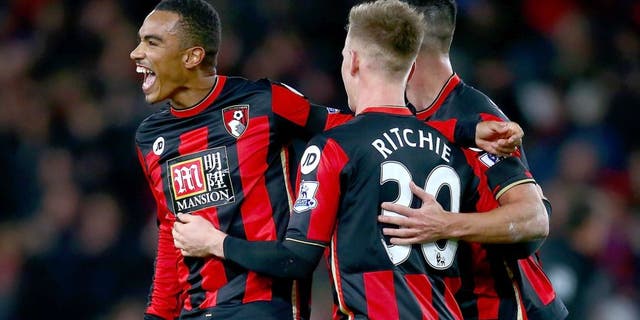 BOURNEMOUTH, ENGLAND - DECEMBER 12: Matt Ritchie, Junior Stanislas and Andrew Surman of Bournemouth celebrate after the final whistle in the Barclays Premier League match between A.F.C. Bournemouth and Manchester United at Vitality Stadium on December 12, 2015 in Bournemouth, United Kingdom. (Photo by Jordan Mansfield/Getty Images)