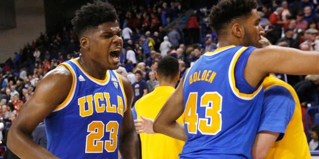 UCLA's Tony Parker (23) celebrates after an NCAA college basketball game against Gonzaga, Saturday, Dec. 12, 2015, in Spokane, Wash. UCLA won 71-66. (AP Photo/Young Kwak)