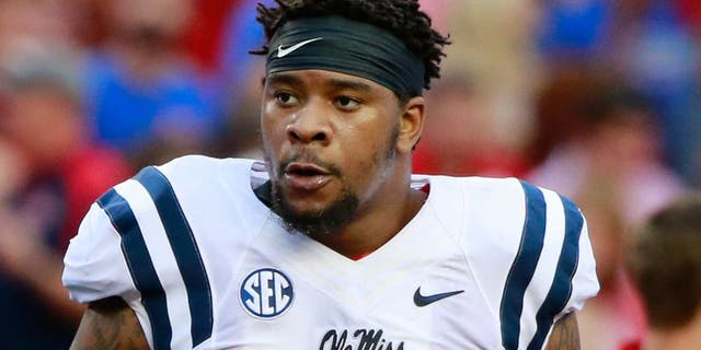 Oct 3, 2015; Gainesville, FL, USA; Mississippi Rebels defensive tackle Robert Nkemdiche (5) works out prior to the game at Ben Hill Griffin Stadium. Mandatory Credit: Kim Klement-USA TODAY Sports