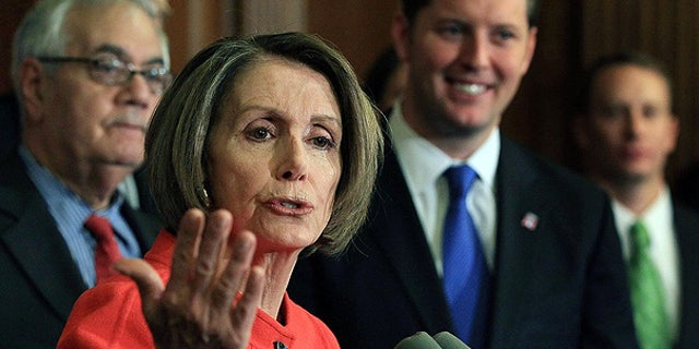 Dec. 15: House Speaker Nancy Pelosi is flanked by Rep. Barney Frank, left, and Rep. Patrick Murphy during a news conference on Capitol Hill.
