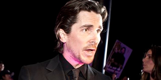 December 12, 2011: English actor Christian Bale speaks to journalists during an interview on the red carpet as he arrives for an event of the Zhang Yimou-directed new movie "The Flowers of War" in Beijing, China.