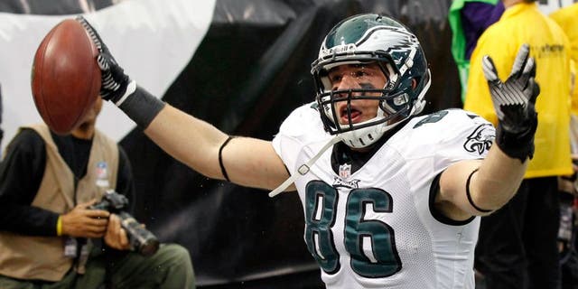 Philadelphia Eagles tight end Zach Ertz reacts after catching a 3-yard touchdown pass during the second half of an NFL football game against the Minnesota Vikings, Sunday, Dec. 15, 2013, in Minneapolis. (AP Photo/Ann Heisenfelt)