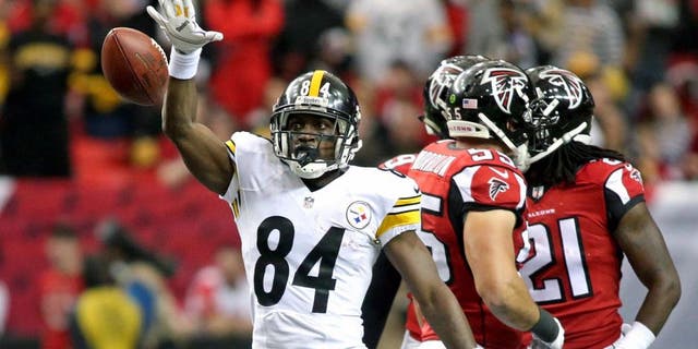 Dec 14, 2014; Atlanta, GA, USA; Pittsburgh Steelers wide receiver Antonio Brown (84) reacts after a first down catch in the first quarter of their game against the Atlanta Falcons at the Georgia Dome. Mandatory Credit: Jason Getz-USA TODAY Sports