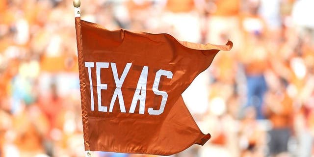 AUSTIN, TX - SEPTEMBER 25: A flag for the Texas Longhorns waves at Darrell K Royal-Texas Memorial Stadium on September 25, 2010 in Austin, Texas. (Photo by Ronald Martinez/Getty Images)