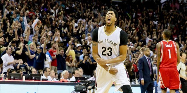 Dec 26, 2015; New Orleans, LA, USA; New Orleans Pelicans forward Anthony Davis (23) celebrates after defeating the Houston Rockets 110-108 at the Smoothie King Center. Mandatory Credit: Derick E. Hingle-USA TODAY Sports