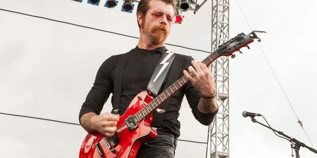 FILE - In this Sept. 11, 2015 file photo, Jesse Hughes of Eagles of Death Metal performs at Riot Fest & Carnival in Chicago.
