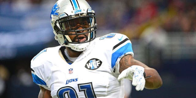 Dec 13, 2015; St. Louis, MO, USA; Detroit Lions wide receiver Calvin Johnson (81) points to the sideline during the second half against the St. Louis Rams at the Edward Jones Dome. The Rams defeated the Lions 21-14. Mandatory Credit: Jeff Curry-USA TODAY Sports