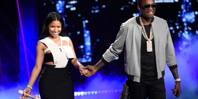 File- This June 28, 2015, file photo shows Nicki Minaj, left, and Meek Mill at the BET Awards at the Microsoft Theater in Los Angeles.