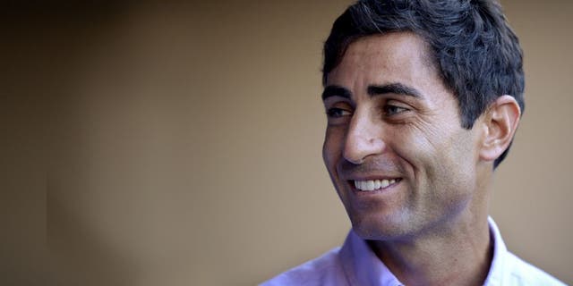 SAN DIEGO, CA - AUGUST 26: AJ Preller of the San Diego Padres visits the dugout prior to the game against the Milwaukee Brewers at Petco Park on August 26, 2014 in San Diego, California. (Photo by Andy Hayt/San Diego Padres/Getty Images)