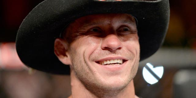 ATLANTIC CITY, NJ - JULY 16: Donald "Cowboy" Cerrone celebrates after defeating Jim Miller in their lightweight bout during the UFC Fight Night event at Revel Casino on July 16, 2014 in Atlantic City, New Jersey. (Photo by Jeff Bottari/Zuffa LLC/Zuffa LLC via Getty Images) *** Local Caption ***Donald Cerrone