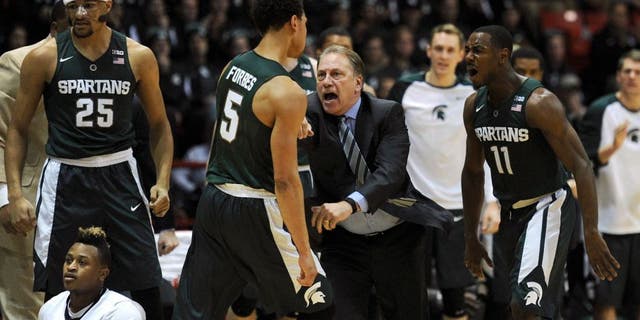 Dec 19, 2015; Boston, MA, USA; Michigan State Spartans head coach Tom Izzo reacts after a play made by guard Bryn Forbes (5) during the first half against the Northeastern Huskies at Matthews Arena. Mandatory Credit: Bob DeChiara-USA TODAY Sports