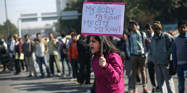 Dec. 19, 2012: An Indian woman shouts slogans outside the Delhi Police headquarters during a protest in New Delhi, India.