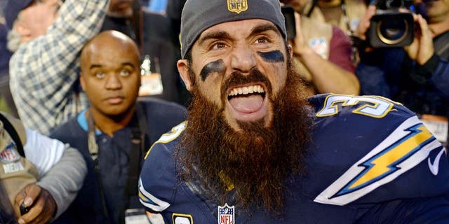 Dec 20, 2015; San Diego, CA, USA; San Diego Chargers free safety Eric Weddle (32) reacts to fans after the Chargers beat the Miami Dolphins 30-14 at Qualcomm Stadium. Mandatory Credit: Jake Roth-USA TODAY Sports