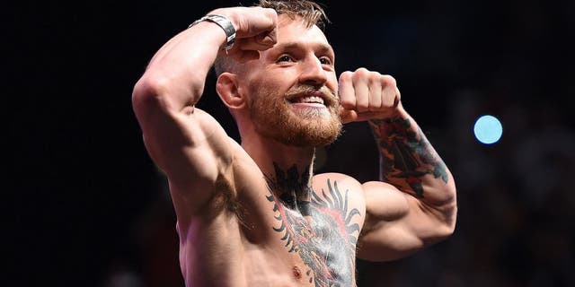 LAS VEGAS, NEVADA - DECEMBER 11: Conor McGregor of Ireland steps on the scale during the UFC 194 Weigh-in event at the MGM Grand Garden Arena on December 11, 2015 in Las Vegas, Nevada. (Photo by Jeff Bottari/Zuffa LLC/Zuffa LLC via Getty Images)