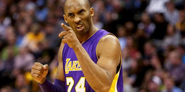 Dec 22, 2015; Denver, CO, USA; Los Angeles Lakers forward Kobe Bryant (24) reacts during the second half against the Denver Nuggets at Pepsi Center. The Lakers won 111-107. Mandatory Credit: Chris Humphreys-USA TODAY Sports