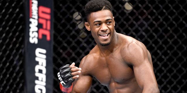 LAS VEGAS, NEVADA - DECEMBER 10: Aljamain Sterling celebrates his win over Johnny Eduardo in their bantamweight bout during the UFC Fight Night event at The Chelsea at the Cosmopolitan of Las Vegas on December 10, 2015 in Las Vegas, Nevada. (Photo by Jeff Bottari/Zuffa LLC/Zuffa LLC via Getty Images)