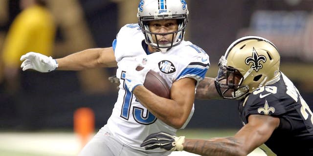 Dec 21, 2015; New Orleans, LA, USA; Detroit Lions wide receiver Golden Tate (15) is tackled by New Orleans Saints cornerback Brandon Browner (39) in the first quarter of the game at the Mercedes-Benz Superdome. Mandatory Credit: Chuck Cook-USA TODAY Sports