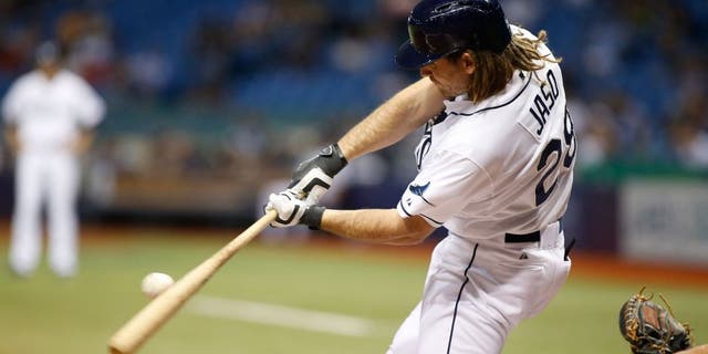 ST. PETERSBURG, FL - OCTOBER 1: John Jaso #28 of the Tampa Bay Rays hits a single to right field off of pitcher Jose Fernandez #16 of the Miami Marlins during the third inning of a game on October 1, 2015 at Tropicana Field in St. Petersburg, Florida. (Photo by Brian Blanco/Getty Images)