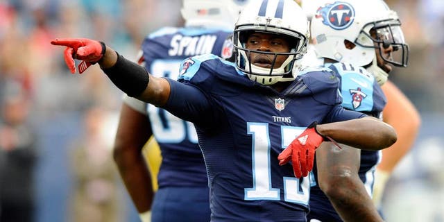 Dec 6, 2015; Nashville, TN, USA; Tennessee Titans receiver Kendall Wright (13) celebrates after a first down during the first half against the Jacksonville Jaguars at Nissan Stadium. Mandatory Credit: Christopher Hanewinckel-USA TODAY Sports