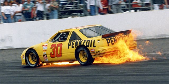 RICHMOND, VA ? March 8, 1992: Michael Waltrip?s Pontiac provides a bit of ?excitement? of its own as he exits in spectacular fashion during the Pontiac Excitement 400 NASCAR Cup race at Richmond International Raceway. The engine blew in Waltrip?s Pennzoil Pontiac on lap 259. (Photo by ISC Images & Archives via Getty Images)