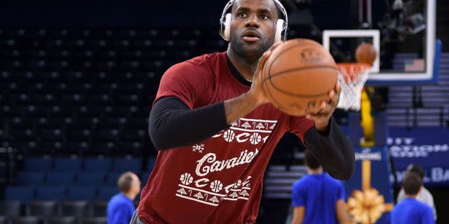 OAKLAND, CA - DECEMBER 25: LeBron James #23 of the Cleveland Cavaliers warms up prior to playing the Golden State Warriors in an NBA basketball game at ORACLE Arena on December 25, 2015 in Oakland, California. NOTE TO USER: User expressly acknowledges and agrees that, by downloading and or using this photograph, User is consenting to the terms and conditions of the Getty Images License Agreement. (Photo by Thearon W. Henderson/Getty Images)
