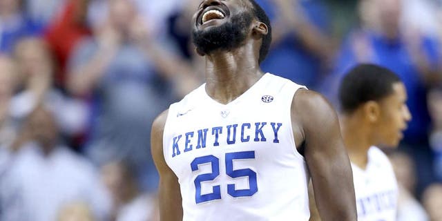 LEXINGTON, KY - DECEMBER 26: Dominique Hawkins #25 of the Kentucky Wildcats celebrates against the Louisville Cardinals at Rupp Arena on December 26, 2015 in Lexington, Kentucky. (Photo by Andy Lyons/Getty Images)