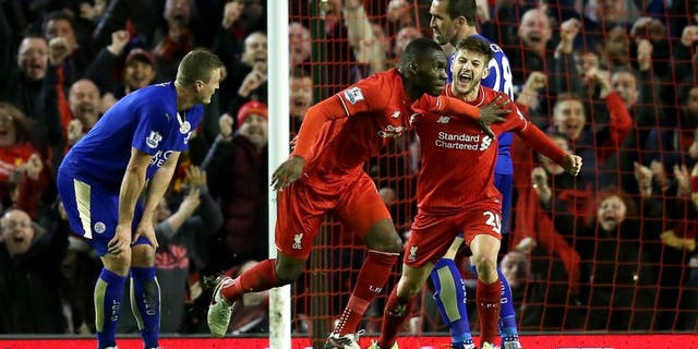 LIVERPOOL, ENGLAND - DECEMBER 26: Christian Benteke of Liverpool celebrates scoring his side's first goal during the Barclays Premier League match between Liverpool and Leicester City at Anfield on December 26, 2015 in Liverpool, England. (Photo by Chris Brunskill/Getty Images)