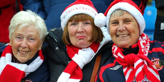 MANCHESTER, ENGLAND - DECEMBER 26: Sunderland fans enjoy the atmosphere during the Barclays Premier League match between Manchester City and Sunderland at the Etihad Stadium on December 26, 2015 in Manchester, England. (Photo by Alex Livesey/Getty Images)