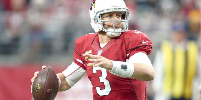 Dec 27, 2015; Glendale, AZ, USA; Arizona Cardinals quarterback Carson Palmer (3) throws a pass against the Green Bay Packers during the first half at University of Phoenix Stadium. Mandatory Credit: Joe Camporeale-USA TODAY Sports