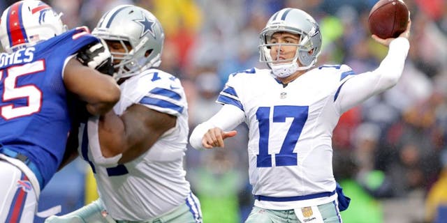 ORCHARD PARK, NY - DECEMBER 27: Kellen Moore #17 of the Dallas Cowboys throws against the Buffalo Bills during the first half at Ralph Wilson Stadium on December 27, 2015 in Orchard Park, New York. (Photo by Brett Carlsen/Getty Images)