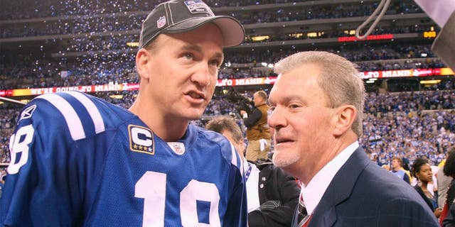 INDIANAPOLIS - JANUARY 24: Quarterback Peyton Manning #18 of the Indianapolis Colts celebrates the victory with owner Jim Irsay when the Indianapolis Colts host the New York Jets in the AFC Championship Game at Lucas Oil Stadium on January 24, 2010 in Indianapolis, Indiana. Colts beat the Jets, 30-17, to advance tot he Super Bowl. (Photo by Al Pereira/Getty Images)