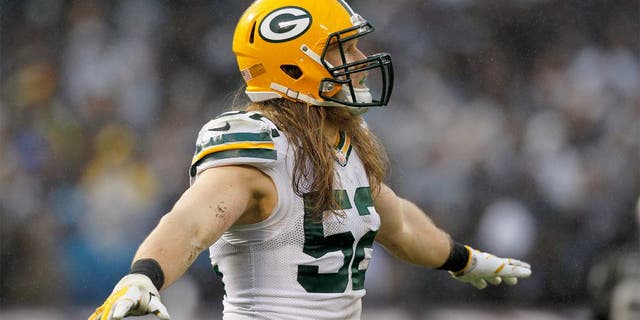 Dec 20, 2015; Oakland, CA, USA; Green Bay Packers inside linebacker Clay Matthews (52) reacts after the Packers made a defensive stop on fourth down against the Oakland Raiders in the fourth quarter at O.co Coliseum. The Packers defeated the Raiders 30-20. Mandatory Credit: Cary Edmondson-USA TODAY Sports