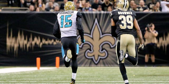 Dec 27, 2015; New Orleans, LA, USA; Jacksonville Jaguars wide receiver Allen Robinson (15) catches a touchdown over New Orleans Saints cornerback Brandon Browner (39) during the second half of a game at the Mercedes-Benz Superdome. The Saints defeated the Jaguars 38-27. Mandatory Credit: Derick E. Hingle-USA TODAY Sports