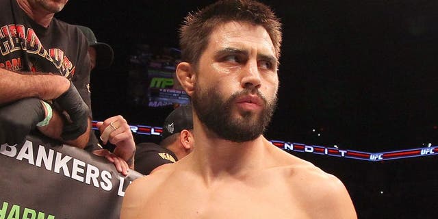 INDIANAPOLIS, IN - AUGUST 28: Carlos Condit stands in the Octagon before his welterweight fight against Martin Kampmann during the UFC on FOX Sports 1 event at Bankers Life Fieldhouse on August 28, 2013 in Indianapolis, Indiana. (Photo by Ed Mulholland/Zuffa LLC/Zuffa LLC via Getty Images)