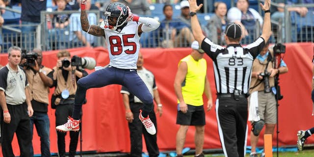 Dec 27, 2015; Nashville, TN, USA; Houston Texans wide receiver Nate Washington (85) celebrates scoring a touchdown against the Tennessee Titans during the second half at Nissan Stadium. Houston won 34-6. Mandatory Credit: Jim Brown-USA TODAY Sports